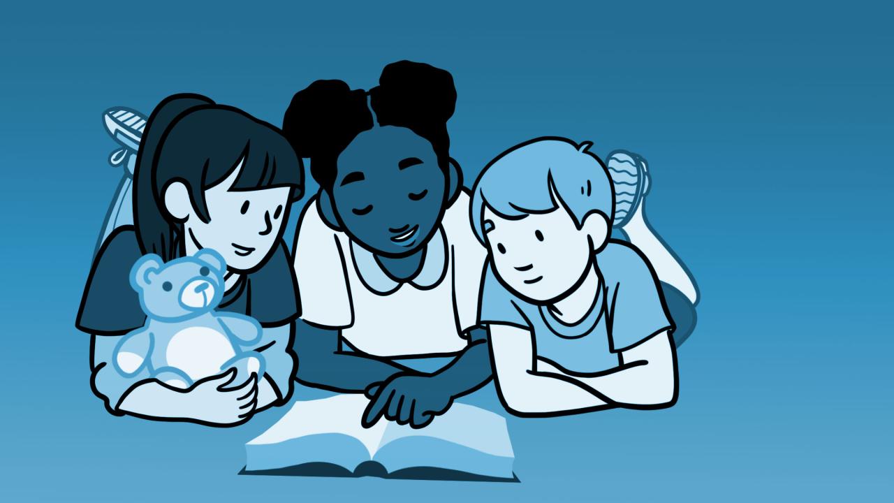 Three children reading a book together