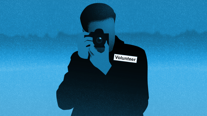 A volunteer taking a photo