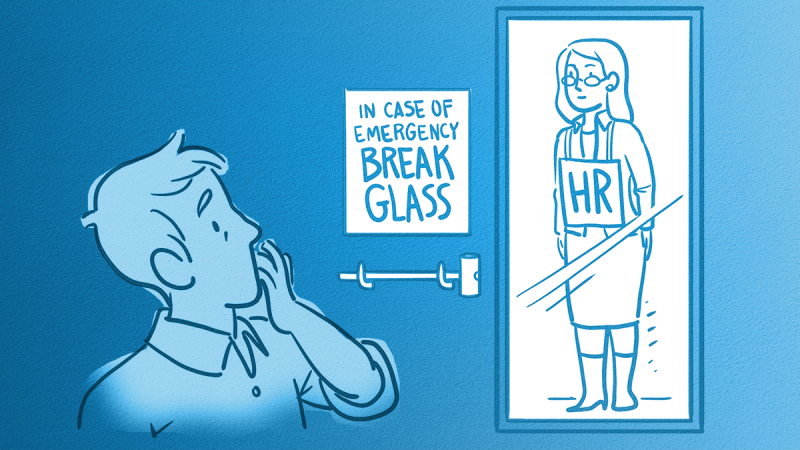 A man distracted next to a "In case of emergency break glass" case with an HR person inside