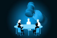 Hand with gavel hovering over board member meeting